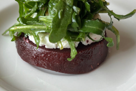 Beet Slices with Goat Cheese, Baby Arugula & Walnut Dressing